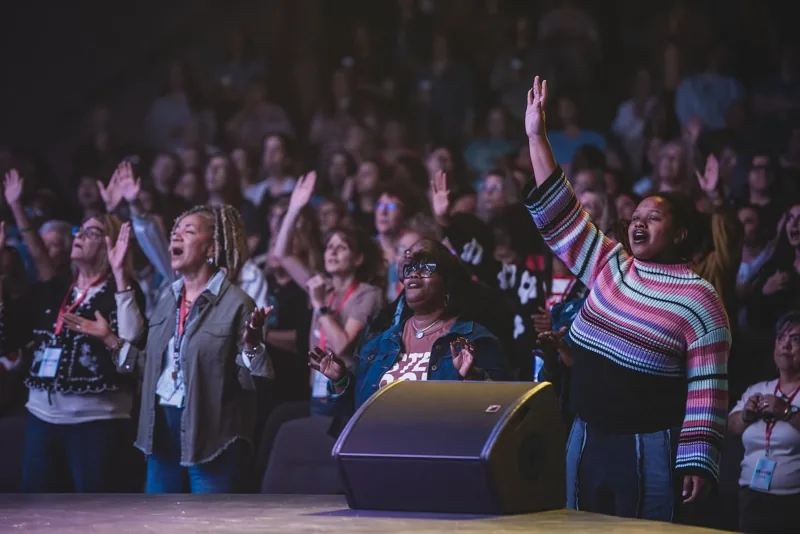 Women worshipping together in the Priceless photo archive